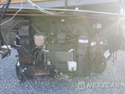 Zdjęcie 7 z 10 samochodu: 2002 FORD MOTORHOME CHASSIS REVCREATIONAL VEHICLE VIN:1FCNF53SX20A04929 - miniatura