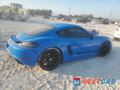 Trzecie zdjęcie samochodu z tyłu: 2024 PORSCHE CAYMAN BASE VIN:WP0AA2A8XRK255158 - miniatura