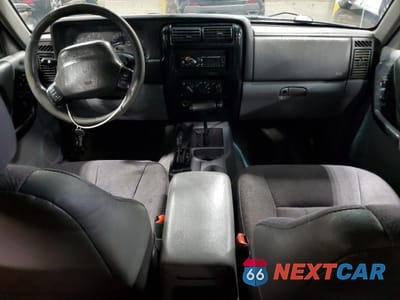 Zdjęcie 8 z 12 samochodu: 1998 JEEP CHEROKEE SPORT VIN:1J4FJ68S9WL142557 - miniatura