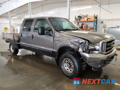 Czwarte zdjęcie samochodu z boku: 2002 FORD F250 SUPER DUTY VIN:1FTNW21F52EC56661 - miniatura