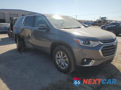 Czwarte zdjęcie samochodu z boku: 2019 CHEVROLET TRAVERSE LT VIN:1GNERHKW4KJ260885 - miniatura