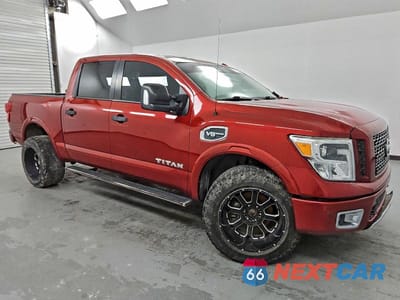 Czwarte zdjęcie samochodu z boku: 2017 NISSAN TITAN SV VIN:1N6AA1E51HN524832 - miniatura