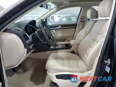 Zdjęcie 7 z 12 samochodu: 2014 VOLKSWAGEN TOUAREG V6 TDI VIN:WVGEP9BP4ED001471 - miniatura