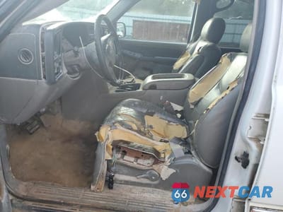 Zdjęcie 7 z 13 samochodu: 2003 GMC YUKON VIN:1GKEC13Z03R143547 - miniatura
