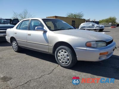 Czwarte zdjęcie samochodu z boku: 1996 TOYOTA CAMRY VIN:JT2BG12K4T0382555 - miniatura