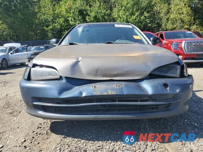 Piąte zdjęcie samochodu w środku: 1995 HONDA CIVIC LX VIN:1HGEG8555SL044356 - miniatura