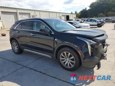 Czwarte zdjęcie samochodu z boku: 2019 CADILLAC XT4 PREMIUM LUXURY VIN:1GYFZCR48KF135809 - miniatura