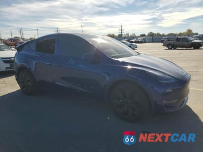 Czwarte zdjęcie samochodu z boku: 2025 TESLA MODEL Y VIN:7SAYGDEE6SF305777 - miniatura