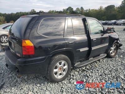 Trzecie zdjęcie samochodu z tyłu: 2003 GMC ENVOY VIN:1GKDT13S532223787 - miniatura
