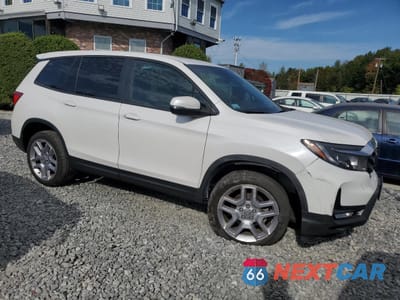 Czwarte zdjęcie samochodu z boku: 2024 HONDA PASSPORT EXL VIN:5FNYF8H51RB019803 - miniatura