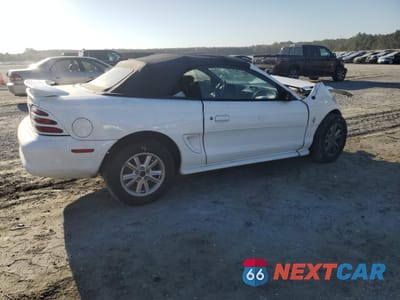 Trzecie zdjęcie samochodu z tyłu: 1994 FORD MUSTANG VIN:1FALP4449RF133711 - miniatura