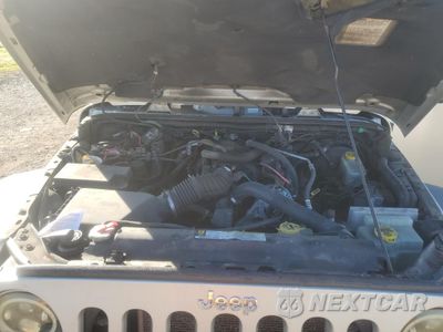 Zdjęcie 12 z 13 samochodu: 2007 JEEP WRANGLER X VIN:1J4GA39197L122660 - miniatura