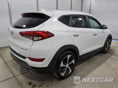 Trzecie zdjęcie samochodu z tyłu: 2016 HYUNDAI TUCSON LIMITED VIN:KM8J33A21GU253050 - miniatura