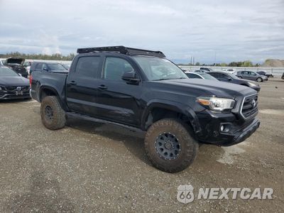 Czwarte zdjęcie samochodu z boku: 2016 TOYOTA TACOMA DOUBLE CAB VIN:3TMCZ5AN9GM022340 - miniatura