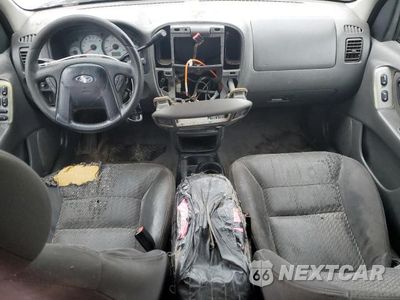 Zdjęcie 8 z 12 samochodu: 2003 FORD ESCAPE XLT VIN:1FMYU93183KD75039 - miniatura