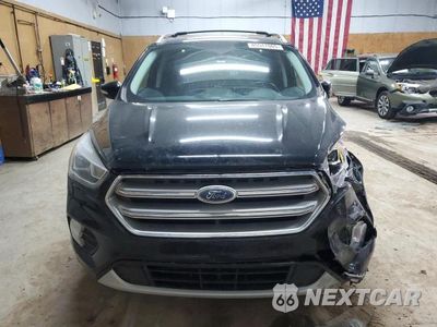 Piąte zdjęcie samochodu w środku: 2017 FORD ESCAPE TITANIUM VIN:1FMCU9J99HUD26575 - miniatura