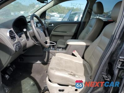 Zdjęcie 7 z 13 samochodu: 2009 FORD TAURUS X SEL VIN:1FMDK02W29GA03382 - miniatura