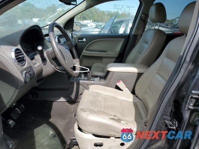 Zdjęcie 7 z 13 samochodu: 2009 FORD TAURUS X SEL VIN:1FMDK02W29GA03382 - miniatura