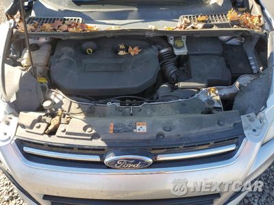 Zdjęcie 12 z 13 samochodu: 2015 FORD ESCAPE TITANIUM VIN:1FMCU0J9XFUC58666 - miniatura