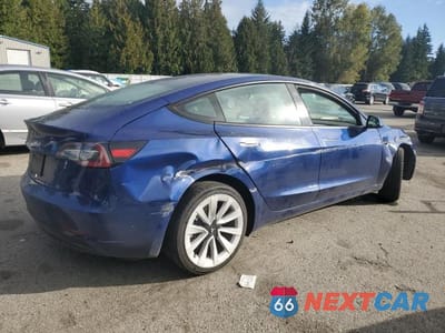 Trzecie zdjęcie samochodu z tyłu: 2022 TESLA MODEL 3 VIN:5YJ3E1EA7NF369887 - miniatura