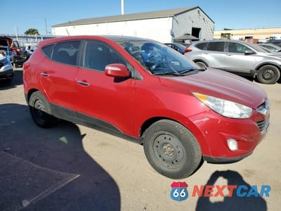 Czwarte zdjęcie samochodu z boku: 2010 HYUNDAI TUCSON GLS VIN:KM8JUCAC5AU023217 - miniatura