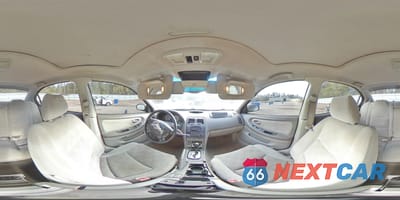 Zdjęcie 15 z 15 samochodu: 2002 NISSAN MAXIMA GLE VIN:JN1DA31D22T428075 - miniatura