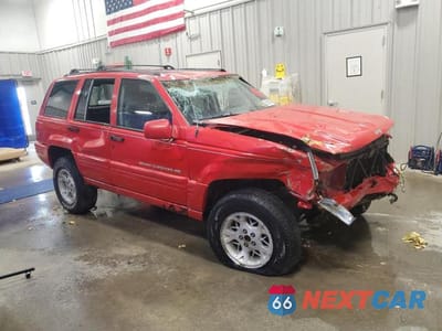 Czwarte zdjęcie samochodu z boku: 1998 JEEP GRAND CHEROKEE LIMITED VIN:1J4GZ78Y1WC136047 - miniatura