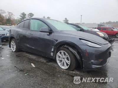 Czwarte zdjęcie samochodu z boku: 2024 TESLA MODEL Y VIN:7SAYGDED9RF018824 - miniatura