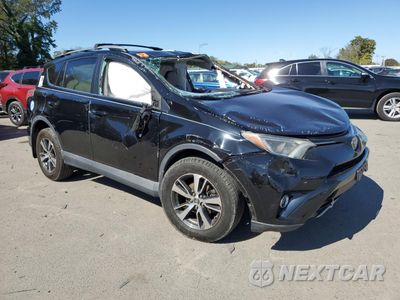 Czwarte zdjęcie samochodu z boku: 2017 TOYOTA RAV4 XLE VIN:2T3RFREV2HW614263 - miniatura