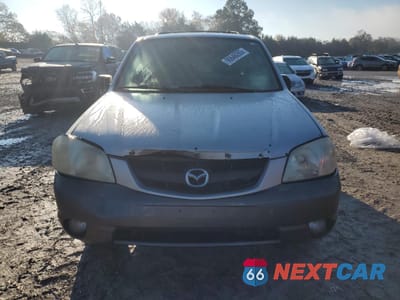 Piąte zdjęcie samochodu w środku: 2003 MAZDA TRIBUTE ES VIN:4F2CZ96133KM41752 - miniatura