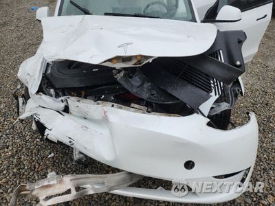 Zdjęcie 12 z 15 samochodu: 2023 TESLA MODEL Y VIN:7SAYGAEE4PF931561 - miniatura