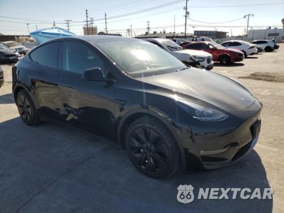 Czwarte zdjęcie samochodu z boku: 2024 TESLA MODEL Y VIN:7SAYGAEE0RF202220 - miniatura