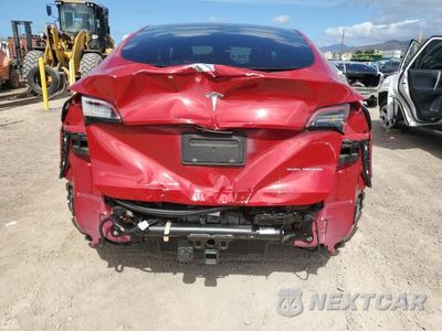 Zdjęcie 6 z 11 samochodu: 2022 TESLA MODEL Y VIN:7SAYGAEE8NF415443 - miniatura