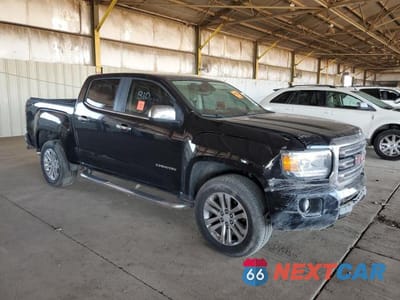 Czwarte zdjęcie samochodu z boku: 2018 GMC CANYON SLT VIN:1GTG5DEN4J1172121 - miniatura