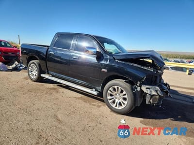 Czwarte zdjęcie samochodu z boku: 2013 RAM 1500 LONGHORN VIN:1C6RR7PT7DS723464 - miniatura