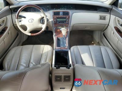 Zdjęcie 8 z 12 samochodu: 2003 TOYOTA AVALON VIN:4T1BF28B93U317888 - miniatura