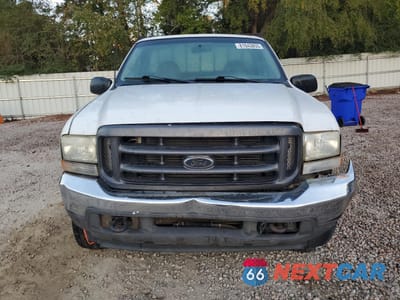 Piąte zdjęcie samochodu w środku: 2002 FORD F250 SUPER DUTY VIN:1FTNF21F32EA92309 - miniatura