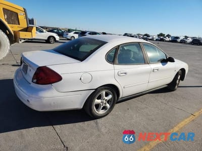Trzecie zdjęcie samochodu z tyłu: 2002 FORD TAURUS SES VIN:1FAFP55292A206188 - miniatura