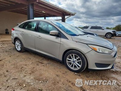 Czwarte zdjęcie samochodu z boku: 2016 FORD FOCUS SE VIN:1FADP3F2XGL210885 - miniatura