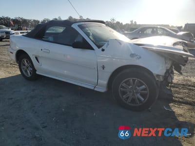 Czwarte zdjęcie samochodu z boku: 1994 FORD MUSTANG VIN:1FALP4449RF133711 - miniatura