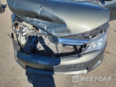 Zdjęcie 11 z 11 samochodu: 2012 TOYOTA CAMRY HYBRID VIN:4T1BD1FK2CU062567 - miniatura