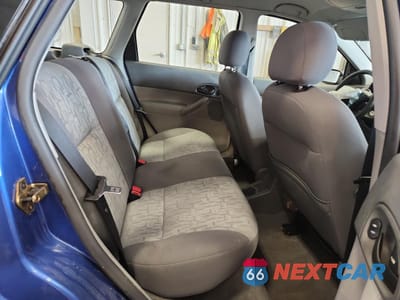 Zdjęcie 11 z 14 samochodu: 2005 FORD FOCUS ZXW VIN:1FAFP36N75W262618 - miniatura