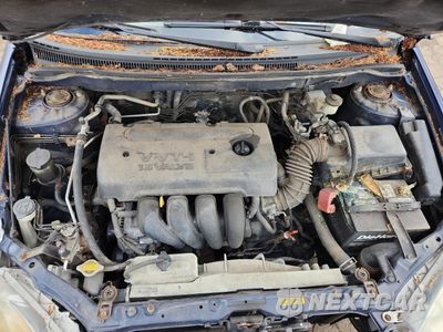 Zdjęcie 11 z 12 samochodu: 2005 TOYOTA COROLLA CE VIN:2T1BR30E25C485248 - miniatura