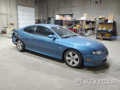 Czwarte zdjęcie samochodu z boku: 2004 PONTIAC GTO VIN:6G2VX12G64L287373 - miniatura