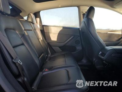 Zdjęcie 10 z 11 samochodu: 2023 TESLA MODEL Y VIN:7SAYGDEE9PA144264 - miniatura