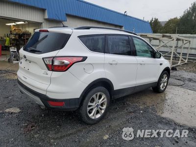 Trzecie zdjęcie samochodu z tyłu: 2018 FORD ESCAPE SE VIN:1FMCU9GD5JUC76985 - miniatura