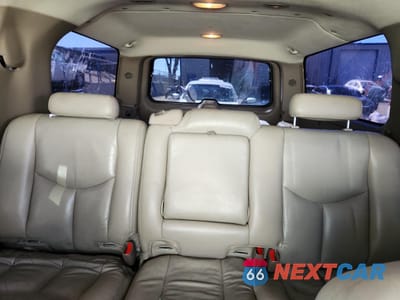 Zdjęcie 10 z 13 samochodu: 2005 GMC YUKON XL C1500 VIN:1GKEC16Z05J188128 - miniatura