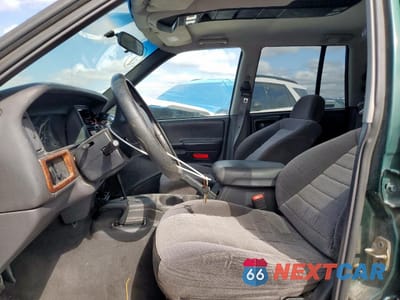 Zdjęcie 7 z 14 samochodu: 1998 JEEP GRAND CHEROKEE LAREDO VIN:1J4GZ58SXWC221758 - miniatura