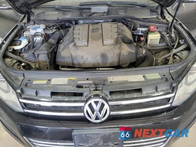 Zdjęcie 12 z 12 samochodu: 2014 VOLKSWAGEN TOUAREG V6 TDI VIN:WVGEP9BP4ED001471 - miniatura