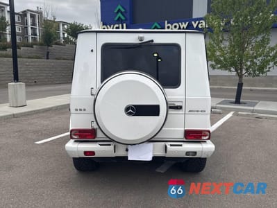 Czwarte zdjęcie samochodu z boku: 2014 MERCEDES-BENZ G 63 AMG VIN:WDCYC7DF7EX216261 - miniatura